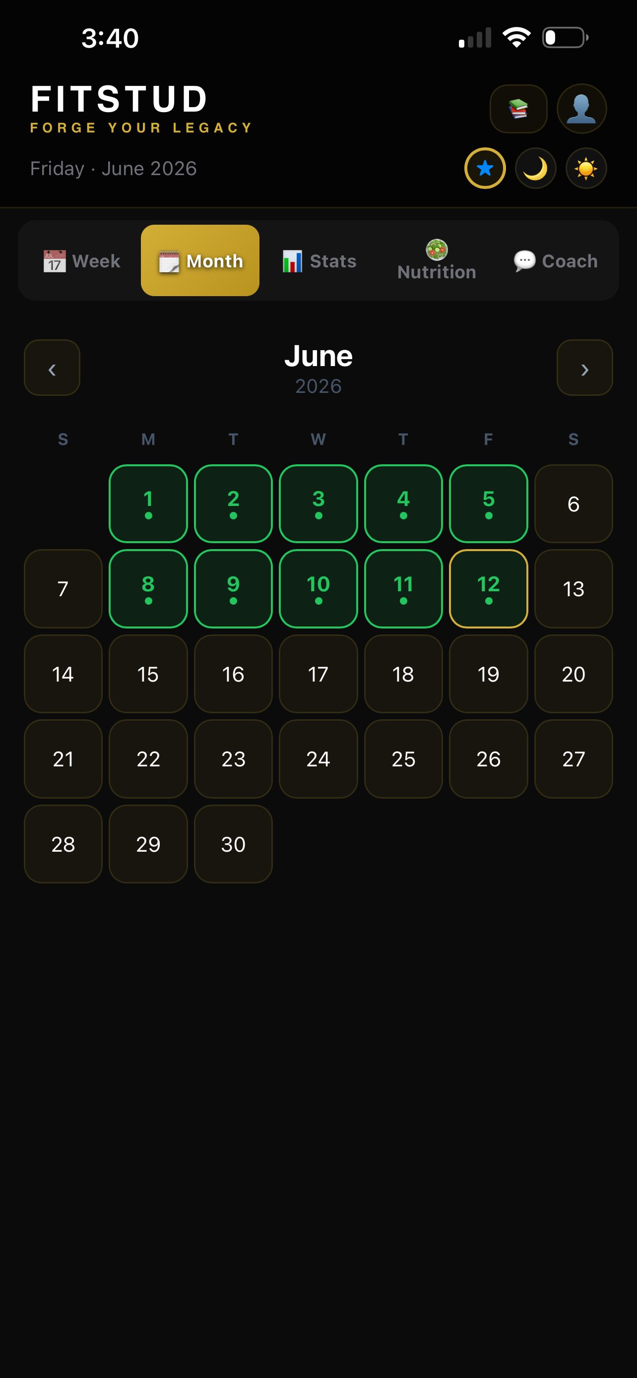 FitStud client app monthly calendar with completed workout days highlighted